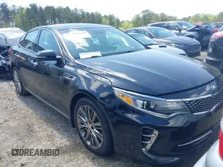 2016 Kia Optima SXL Turbo with VIN 5XXGV4L23GG117486, listed as a IAAI auction lot 41998300 with 142,477 mi miles. Bid and sale history available at carsss.com. Image 1.