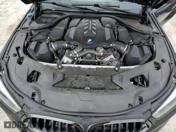 2022 BMW 8 Series M850i xDrive z VIN WBABC4C04NCJ45659, wystawiony jako Copart lot #64786713 z przebiegiem 18 091 mil mil oraz . Historia ofert i sprzedaży dostępna na DreamBid. Obrazek 11.