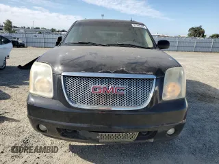 2007 GMC Yukon Denali z VIN 1GKFK63877J235917, wystawiony jako Copart lot #57445735 z przebiegiem 253 961 mil mil oraz Czysty tytuł • Clean title. Historia ofert i sprzedaży dostępna na DreamBid. Obrazek 5.