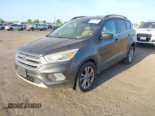 2017 Ford Escape SE with VIN 1FMCU0GD1HUE75697, listed as a IAAI auction lot 42077385 with 160,634 mi miles and . Bid and sale history available at DreamBid. Image 2.