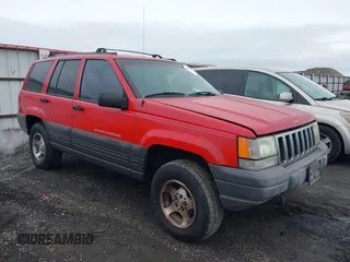 1996 Jeep Grand Cherokee Laredo with VIN 1J4GZ58Y3TC350926, listed as a IAAI auction lot 41224374 with 266,833 mi miles. Bid and sale history available at carsss.com. Image 1.