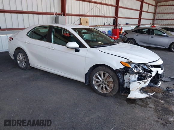 2020 Toyota Camry LE with VIN 4T1C11AK9LU935025, listed as a IAAI auction lot 42054033 with 63,814 mi miles and . Bid and sale history available at carsss.com. Image 1.