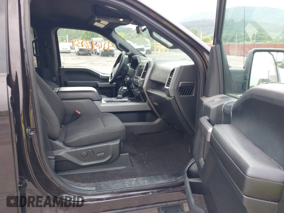 2019 Ford F-150 XL with VIN 1FTEW1E45KFC15573, listed as a IAAI auction lot 42647234 with 66,267 mi miles and . Bid and sale history available at DreamBid. Image 5.