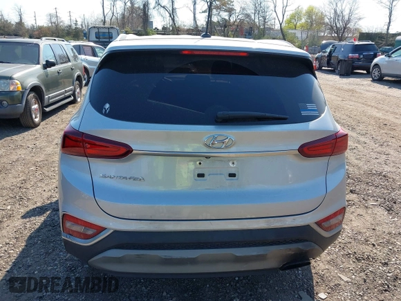 2019 Hyundai Santa Fe SE with VIN 5NMS23AD3KH102739, listed as a IAAI auction lot 42097252 with 116,023 mi miles and . Bid and sale history available at DreamBid. Image 16.
