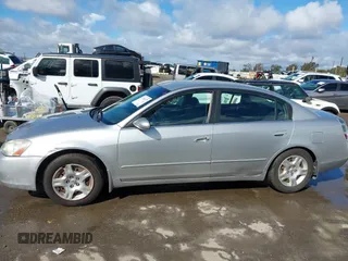 2003 Nissan Altima S with VIN 1N4AL11D43C354986, listed as a IAAI auction lot 41794579 with 135,238 mi miles. Bid and sale history available at carsss.com. Image 14.