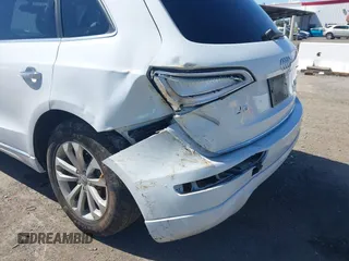 2015 Audi Q5 Premium Plus with VIN WA1LFAFP6FA096946, listed as a IAAI auction lot 41956824 with 97,328 mi miles and . Bid and sale history available at DreamBid. Image 6.