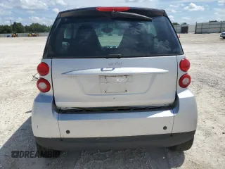 2009 Smart fortwo Pure z VIN WMEEJ31X69K280705, wystawiony jako Copart lot #73877374 z przebiegiem Nie podano mil oraz Nie do naprawy • Non repairable. Historia ofert i sprzedaży dostępna na DreamBid. Obrazek 6.