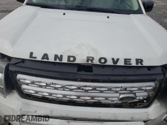 2013 Land Rover LR2 z VIN SALFR2BG4DH372348, wystawiony jako Copart lot #59902505 z przebiegiem Nie podano mil oraz Szkoda całkowita • Salvage title. Historia ofert i sprzedaży dostępna na DreamBid. Obrazek 12.