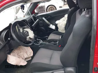 2015 Scion tC z VIN JTKJF5C79FJ013303, wystawiony jako IAAI lot #41581714 z przebiegiem Nie podano mil oraz . Historia ofert i sprzedaży dostępna na DreamBid. Obrazek 5.