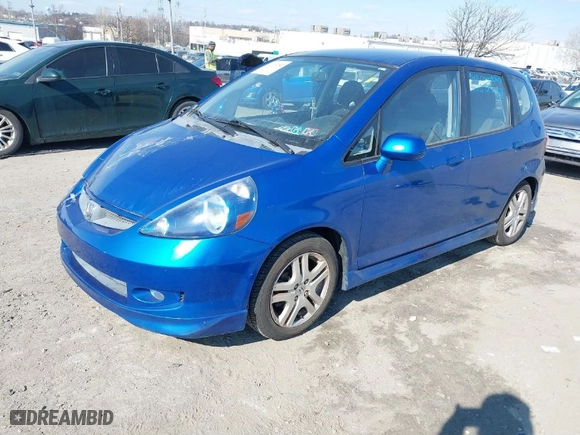 2007 Honda Fit Sport with VIN JHMGD38637S049641, listed as a IAAI auction lot 41674782 with 131,882 mi miles. Bid and sale history available at carsss.com. Image 2.