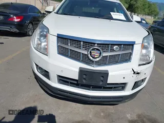 2011 Cadillac SRX Turbo Premium Collection with VIN 3GYFNKE68BS532056, listed as a IAAI auction lot 42447059 with 104,969 mi miles and . Bid and sale history available at DreamBid. Image 6.