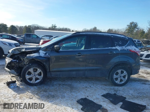 2016 Ford Escape SE with VIN 1FMCU9GX1GUC32307, listed as a IAAI auction lot 41395399 with 142,664 mi miles. Bid and sale history available at carsss.com. Image 14.