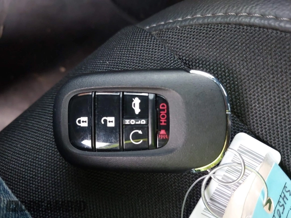 2025 Honda Civic Sport with VIN 2HGFE2F50SH507426, listed as a IAAI auction lot 42087091 with 9,660 mi miles and . Bid and sale history available at DreamBid. Image 11.