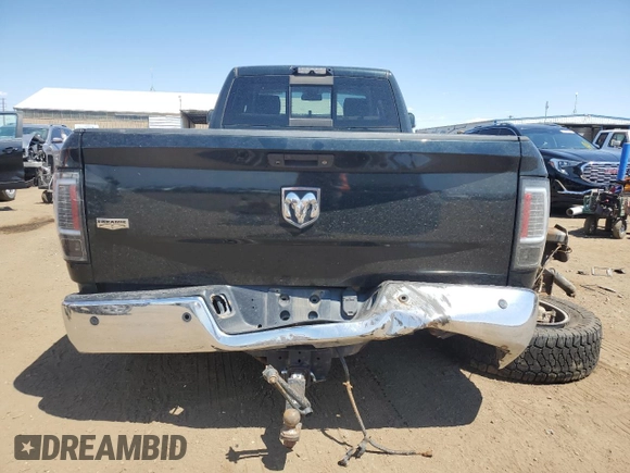 2015 Ram 2500 Laramie with VIN 3C6UR5KL5FG580725, listed as a Copart auction lot 61797534 with 214,156 mi miles and Salvage title. Bid and sale history available at DreamBid. Image 6.