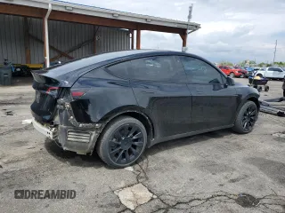 2022 Tesla Model Y Long Range z VIN 7SAYGDEE7NA014402, wystawiony jako Copart lot #56325005 z przebiegiem 41 171 mil mil oraz Szkody całkowita. Historia ofert i sprzedaży dostępna na DreamBid. Obrazek 3.