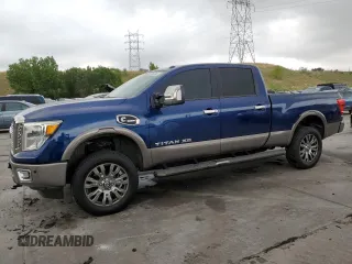 2016 Nissan Titan Platinum Reserve with VIN 1N6BA1F4XGN515605, listed as a Copart auction lot 65182285 with 62,139 mi miles and Clean title. Bid and sale history available at DreamBid. Image 1.