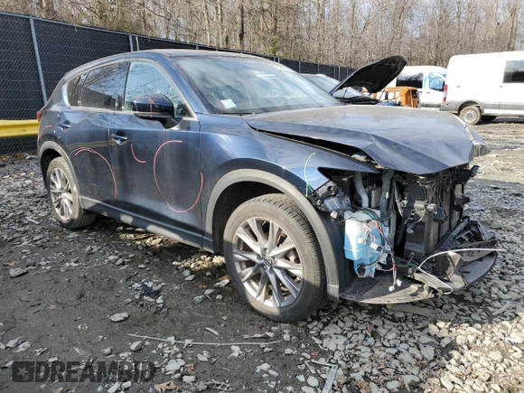 2021 Mazda CX-5 Grand Touring with VIN JM3KFBDM6M1368030, listed as a Copart auction lot 45368665 with 29,175 mi miles and Salvage Title. Bid and sale history available at carsss.com. Image 4.