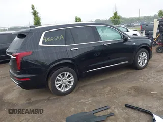 2024 Cadillac XT6 AWD Luxury with VIN 1GYKPBR45RZ750986, listed as a IAAI auction lot 42605419 with 50,929 mi miles and . Bid and sale history available at DreamBid. Image 4.