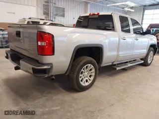 2018 GMC Sierra 1500 SLE with VIN 1GTV2MEC7JZ118876, listed as a IAAI auction lot 41731335 with 157,839 mi miles. Bid and sale history available at carsss.com. Image 4.