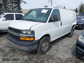 2019 Chevrolet Express Cargo Van with VIN 1GCWGAFG0K1346126, listed as a IAAI auction lot 41764267 with 63,697 mi miles. Bid and sale history available at carsss.com. Image 2.