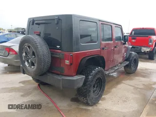 2007 Jeep Wrangler Unlimited Sahara with VIN 1J4GB59197L142223, listed as a IAAI auction lot 42025639 with 155,274 mi miles and . Bid and sale history available at DreamBid. Image 4.