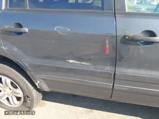 2003 Honda Pilot EX with VIN 2HKYF18503H610799, listed as a IAAI auction lot 41528867 with 323,810 mi miles. Bid and sale history available at carsss.com. Image 6.