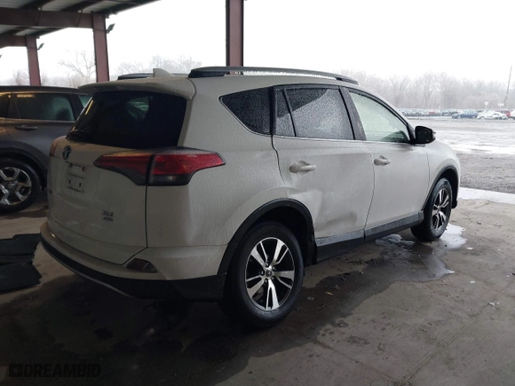 2018 Toyota RAV4 XLE with VIN JTMRFREV6JD222115, listed as a IAAI auction lot 41505367 with 118,126 mi miles. Bid and sale history available at carsss.com. Image 4.