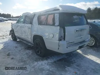 2020 GMC Yukon XL Denali with VIN 1GKS2HKJ3LR223239, listed as a IAAI auction lot 41606846 with 75,452 mi miles. Bid and sale history available at carsss.com. Image 3.
