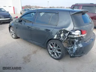 2013 Volkswagen GTI with VIN WVWHV7AJ2DW129476, listed as a IAAI auction lot 41716090 with 132,996 mi miles. Bid and sale history available at carsss.com. Image 3.