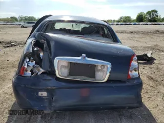 2001 Lincoln Town Car Signature z VIN 1LNHM82W81Y634842, wystawiony jako Copart lot #56839175 z przebiegiem Nie podano mil oraz Szkoda całkowita • Salvage title. Historia ofert i sprzedaży dostępna na DreamBid. Obrazek 6.