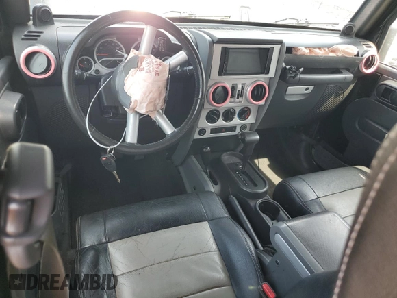 2008 Jeep Wrangler Unlimited Sahara with VIN 1J4GA59178L607960, listed as a Copart auction lot 57855995 with 122,913 mi miles and Salvage title. Bid and sale history available at DreamBid. Image 8.