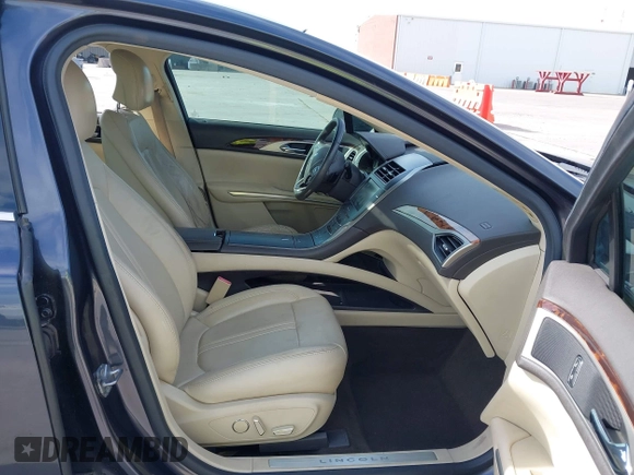 2014 Lincoln MKZ with VIN 3LN6L2GK7ER819756, listed as a IAAI auction lot 42242399 with 140,483 mi miles and . Bid and sale history available at DreamBid. Image 5.