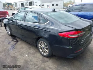 2019 Ford Fusion Hybrid SE with VIN 3FA6P0LU8KR106192, listed as a IAAI auction lot 41917627 with 89,684 mi miles. Bid and sale history available at carsss.com. Image 3.
