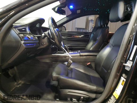 2014 BMW 7 Series ALPINA B7 xDrive with VIN WBAYF8C53ED652566, listed as a Copart auction lot 61177235 with 144,566 mi miles and Salvage title. Bid and sale history available at DreamBid. Image 7.