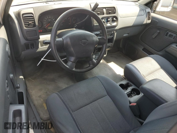 2001 Nissan Frontier XE with VIN 1N6DD26S71C385578, listed as a Copart auction lot 59875405 with 73,936 mi miles and Salvage title. Bid and sale history available at DreamBid. Image 8.