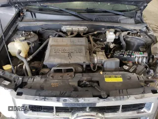 2010 Ford Escape Limited с VIN 1FMCU9EG6AKA55615, выставлен на аукционе Copart как лот 55403005 с пробегом 224 880 миль миль и Списание • Salvage title. История ставок и продаж доступна на DreamBid. Изображение 12.