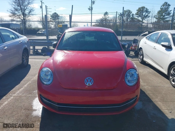 2012 Volkswagen Beetle 2.0T Turbo w/Sun/Sound with VIN 3VWV67ATXCM650376, listed as a IAAI auction lot 41315431 with 104,523 mi miles. Bid and sale history available at carsss.com. Image 12.