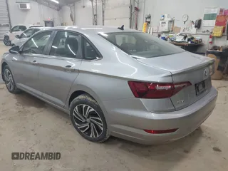 2021 Volkswagen Jetta SEL with VIN 3VWE57BUXMM056379, listed as a IAAI auction lot 42456450 with 34,697 mi miles and . Bid and sale history available at DreamBid. Image 3.