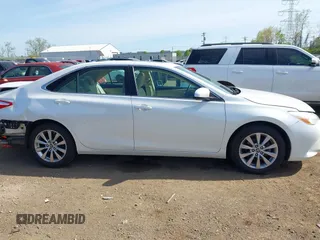 2015 Toyota Camry XLE with VIN 4T1BF1FK1FU977554, listed as a IAAI auction lot 42083589 with 104,811 mi miles and . Bid and sale history available at DreamBid. Image 14.