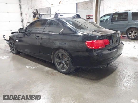 2011 BMW 3 Series 335i xDrive with VIN WBAKF9C53BE247177, listed as a IAAI auction lot 41973181 with 113,986 mi miles. Bid and sale history available at carsss.com. Image 3.
