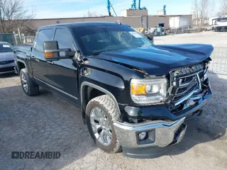 2015 GMC Sierra 1500 SLT with VIN 3GTU2VEJ1FG395885, listed as a IAAI auction lot 38662040 with 124,872 mi miles and . Bid and sale history available at DreamBid. Image 1.