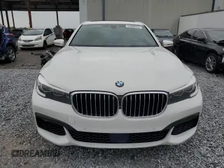 2016 BMW 7 Series 740i with VIN WBA7E2C52GG547112, listed as a Copart auction lot 63069355 with 76,867 mi miles and Salvage title. Bid and sale history available at DreamBid. Image 5.