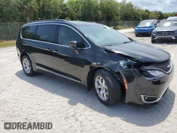 2017 Chrysler Pacifica Touring L with VIN 2C4RC1BG7HR551641, listed as a Copart auction lot 51810185 with 66,860 mi miles and Salvage Title. Bid and sale history available at DreamBid. Image 4.