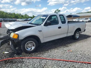 2004 Ford F-150 XL with VIN 2FTRX17W24CA52991, listed as a Copart auction lot 55853095 with 221,452 mi miles and Salvage title. Bid and sale history available at DreamBid. Image 1.