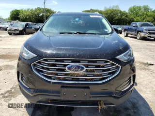 2019 Ford Edge SEL z VIN 2FMPK3J9XKBC19570, wystawiony jako Copart lot #55272125 z przebiegiem 69 602 mil mil oraz Szkoda całkowita • Salvage title. Historia ofert i sprzedaży dostępna na DreamBid. Obrazek 5.