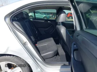 2014 Volkswagen Jetta TDI w/Premium with VIN 3VWLL7AJ6EM424935, listed as a IAAI auction lot 41533634 with 64,028 mi miles and . Bid and sale history available at DreamBid. Image 8.