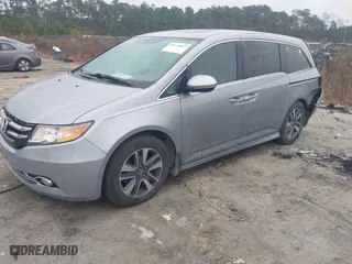 2016 Honda Odyssey Touring Elite with VIN 5FNRL5H90GB097310, listed as a IAAI auction lot 41545601 with 160,198 mi miles. Bid and sale history available at carsss.com. Image 17.