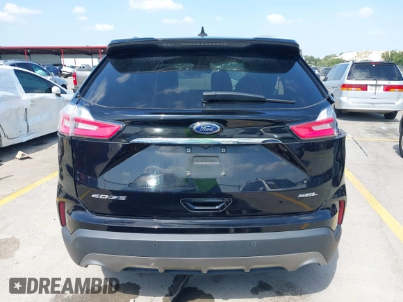2020 Ford Edge SEL with VIN 2FMPK3J93LBB48276, listed as a IAAI auction lot 42410956 with 61,723 mi miles and . Bid and sale history available at DreamBid. Image 17.