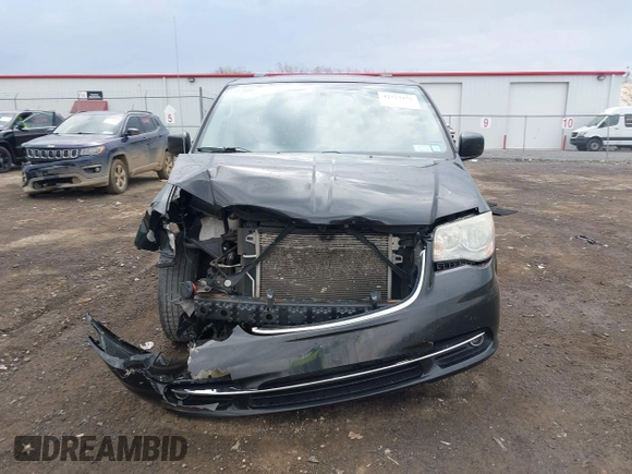 2014 Chrysler Town & Country Touring with VIN 2C4RC1BG7ER449297, listed as a IAAI auction lot 42113170 with 195,878 mi miles and . Bid and sale history available at DreamBid. Image 12.