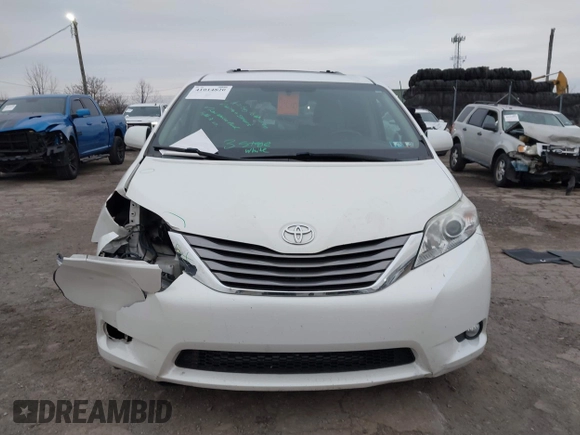 2015 Toyota Sienna XLE with VIN 5TDYK3DC9FS595827, listed as a IAAI auction lot 41014820 with 119,143 mi miles. Bid and sale history available at carsss.com. Image 12.
